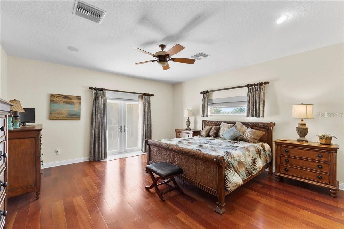 Large second floor bedroom facing west with ensuite bath and two closets