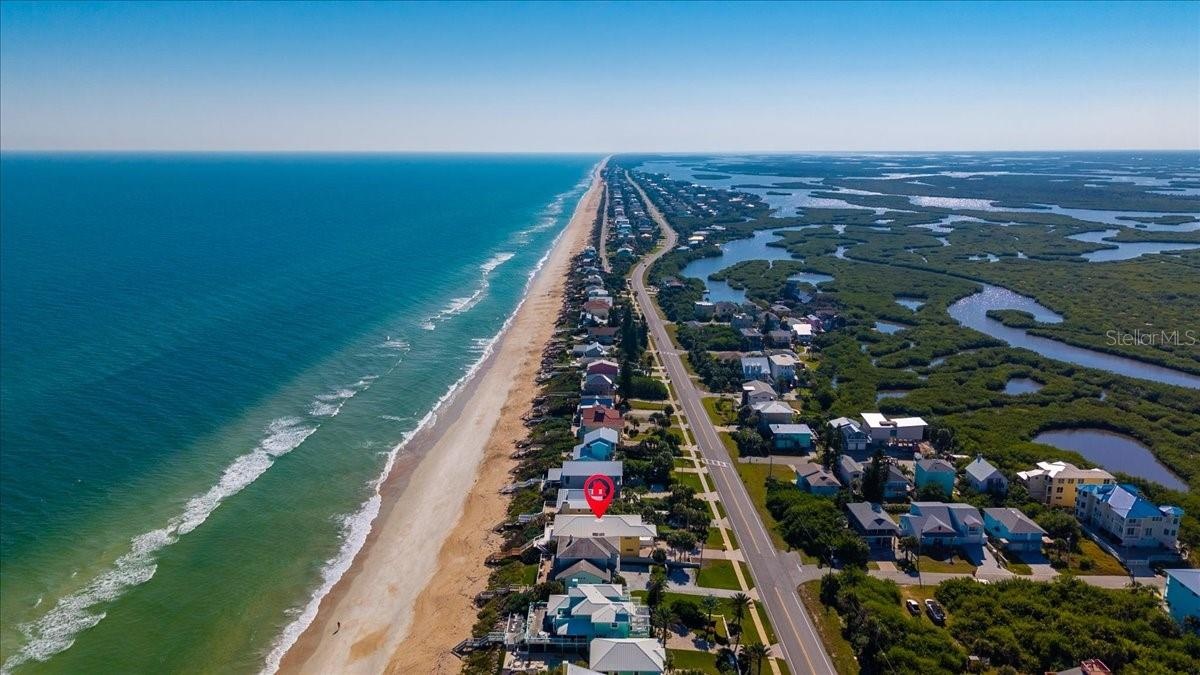 Aerial view of home facing south