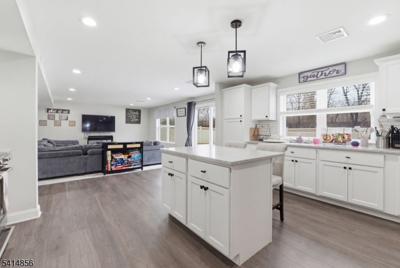 Kitchen opens to Family Room