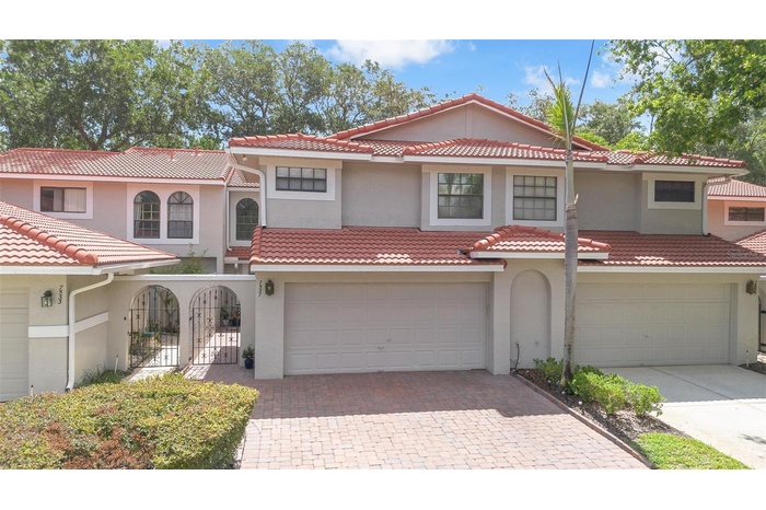 Welcome home to your completely updated & largest floor plan in the desirable and gated Sandpointe Townhomes in the heart of Dr. Phillips.