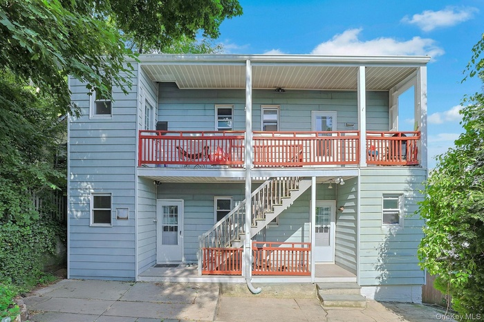 A view of the back of the structure. The units have an identical layout with the exception of Unit #3 (top right in photo), does not have pantry in th