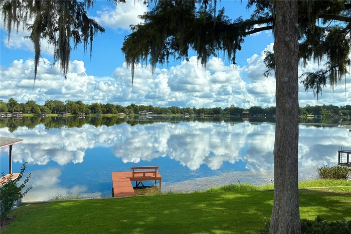 LAKE SUE framed by graceful trees and breathtaking reflections across the tranquil waters of Lake Sue, this extraordinary waterfront setting captures 