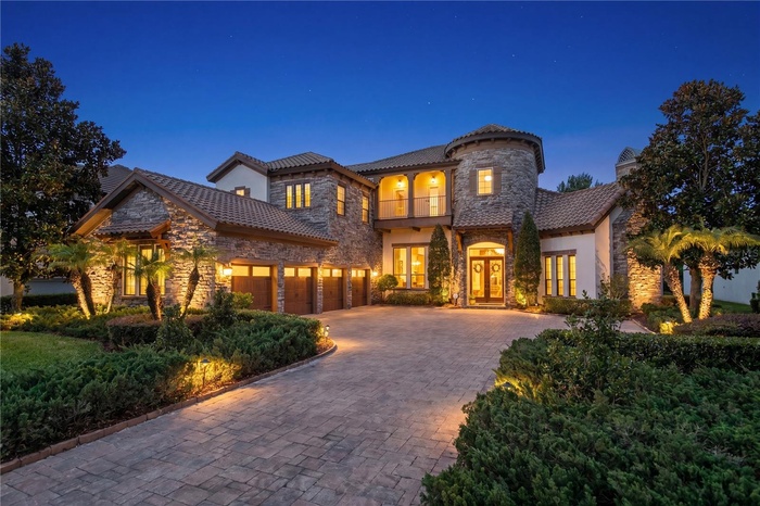 Award-winning WestBay "Venezia" custom estate in gated FishHawk Preserve.