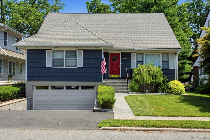 Picture perfect, well-built, mint legal two-family home in the heart of Mamaroneck's sought-after Rye Neck with an enormous level backyard!