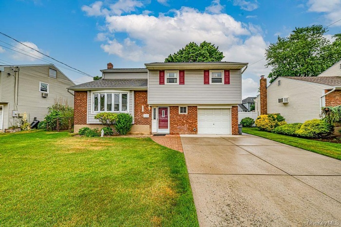 Expanded home set on Cul de sac with basement and 1 car garage