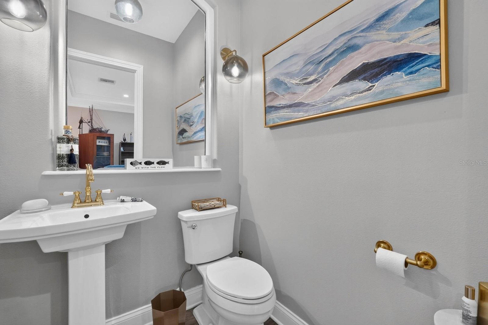 Upstairs half bath off of living room
