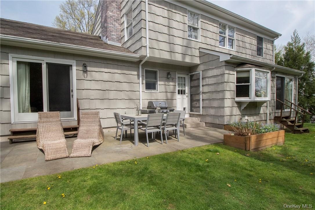 Backyard patio with access from family room and kitchen