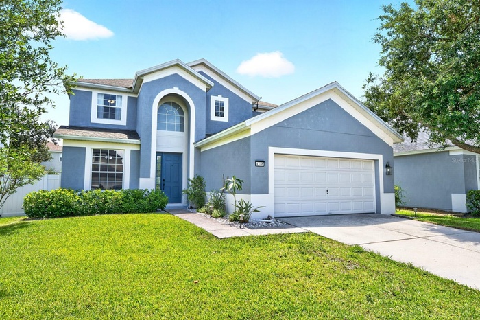 Room to grow, thoughtful UPDATES, and an incredible BACKYARD RETREAT make this spacious two-story home in the sought-after GUARD GATED COMMUNITY of Sp