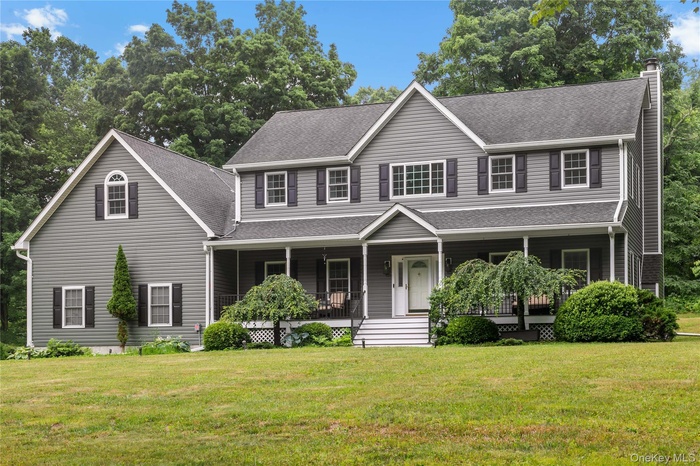 Colonial with attached 2 car garage.