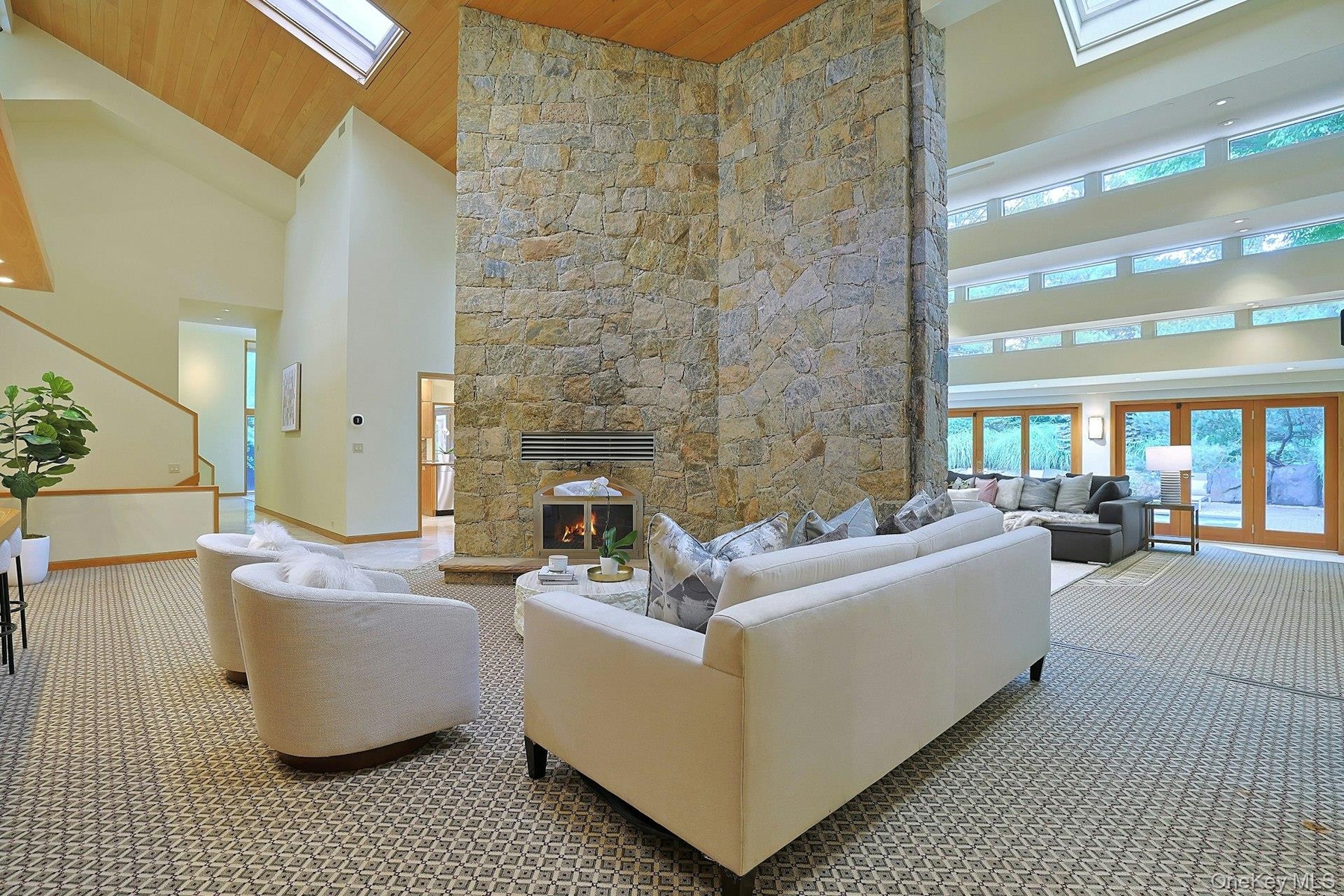 The open, connected floor plan provides multiple areas to gather for casual or more formal entertaining.