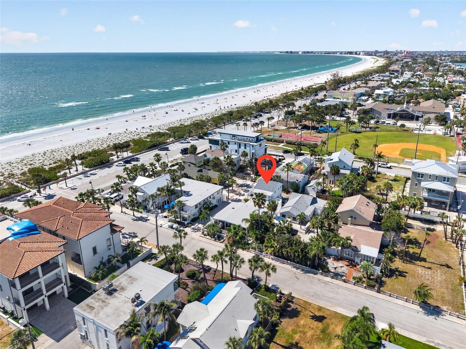 The Sea Loft and Corraline units, with the Cottage in the Front, steps to the beach and the park...exceptional location.