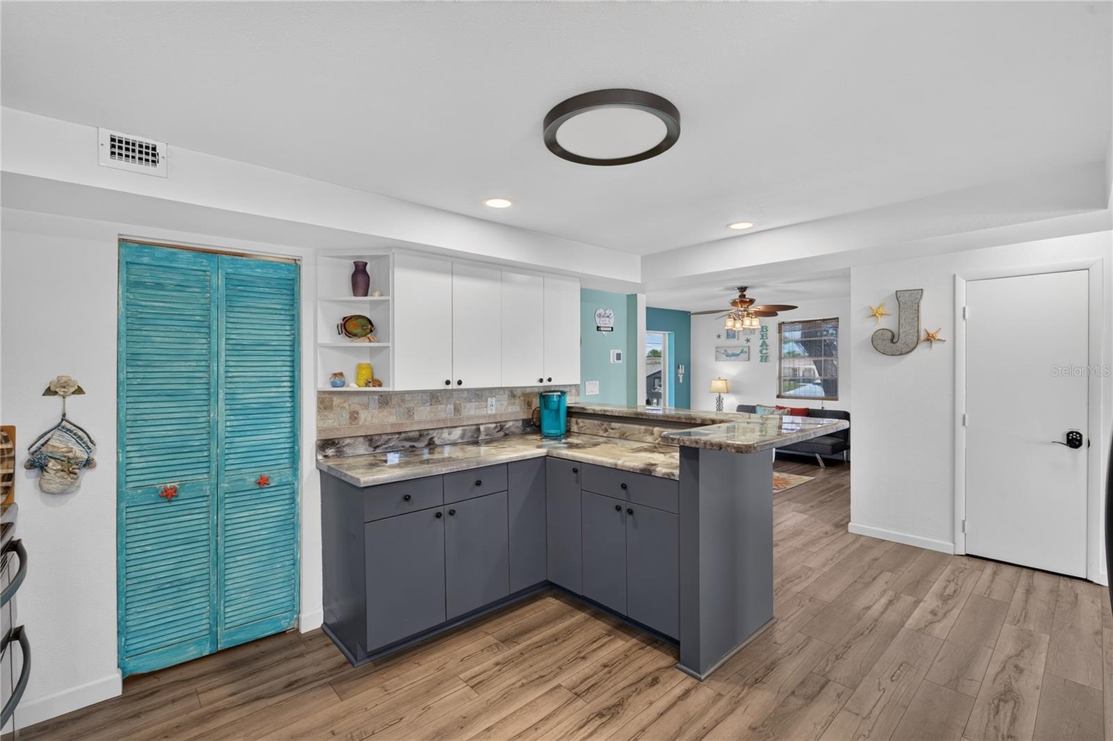 Additional kitchen angle showcasing storage and functional design.
