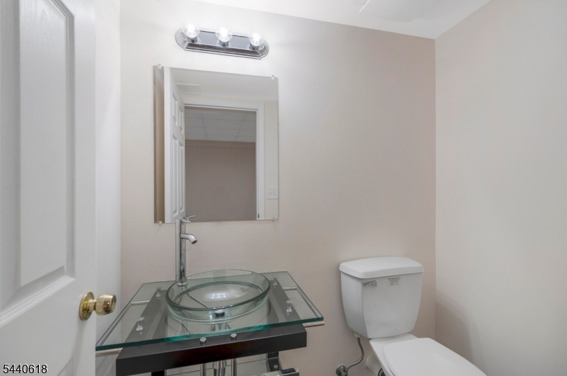 POWDER ROOM, LOWER LEVEL