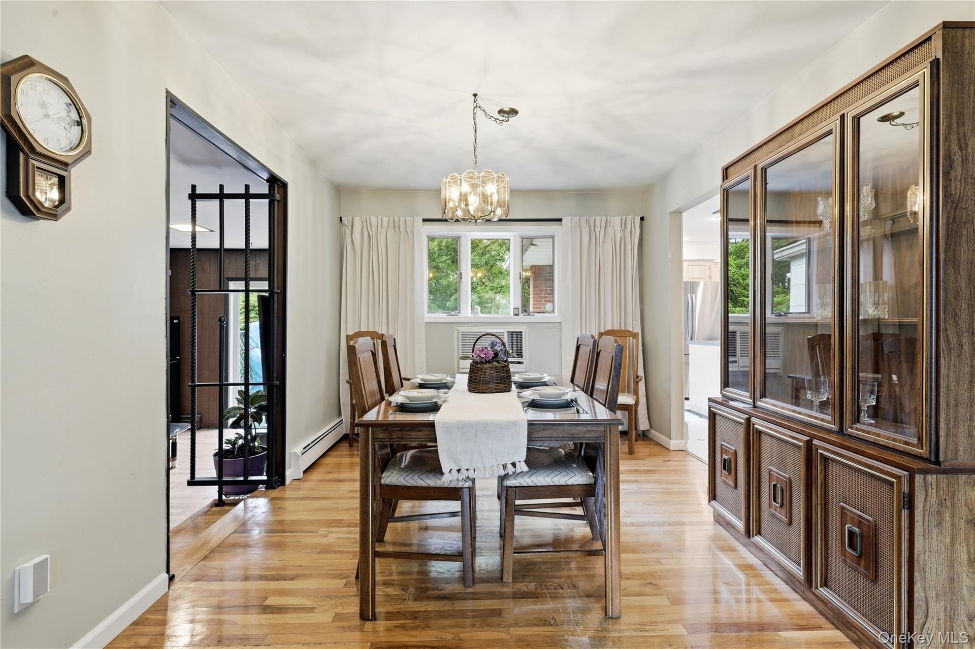 Dining Room with Kitchen and Den on Either Side