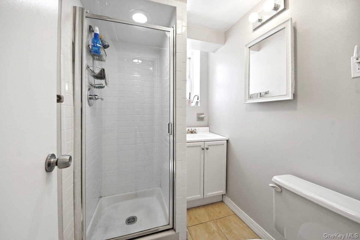 Glass-enclosed shower