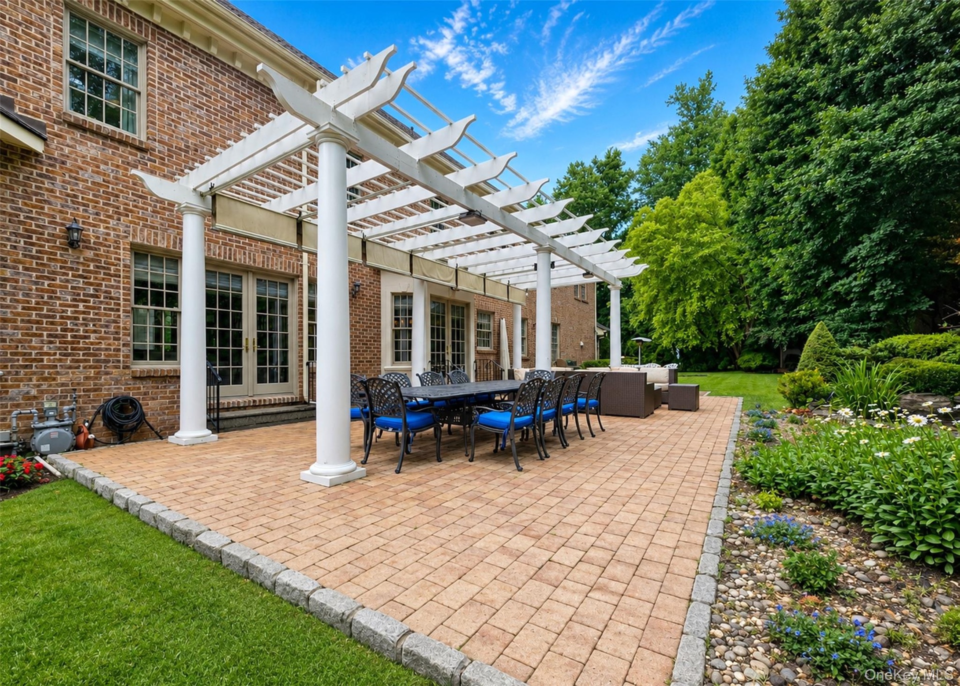 Patio Surrounded by Koi Pond with Waterfalls