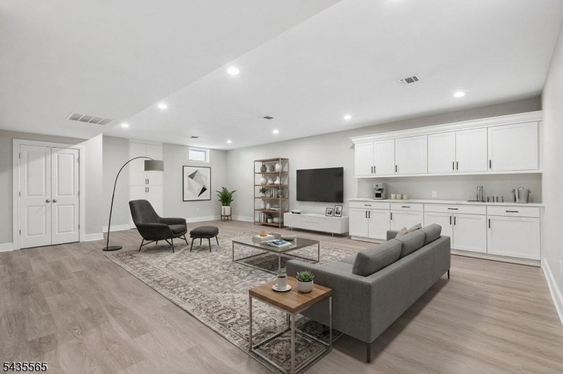 Virtual staged basement rec rm
