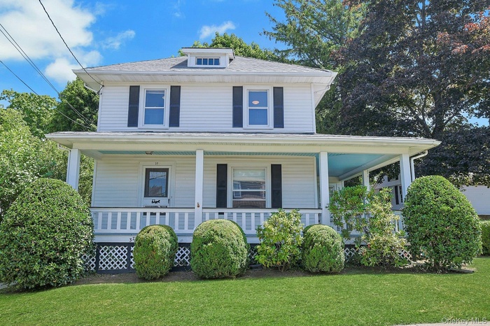 Village Colonial with Wrap Around Front Porch