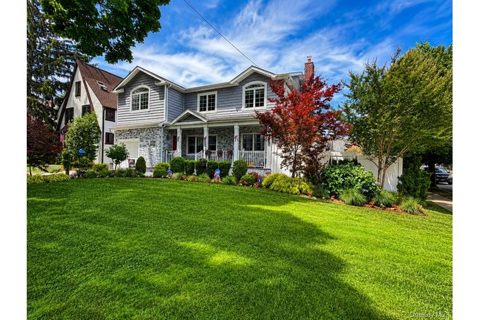 Oversized corner lot on tree lined street.