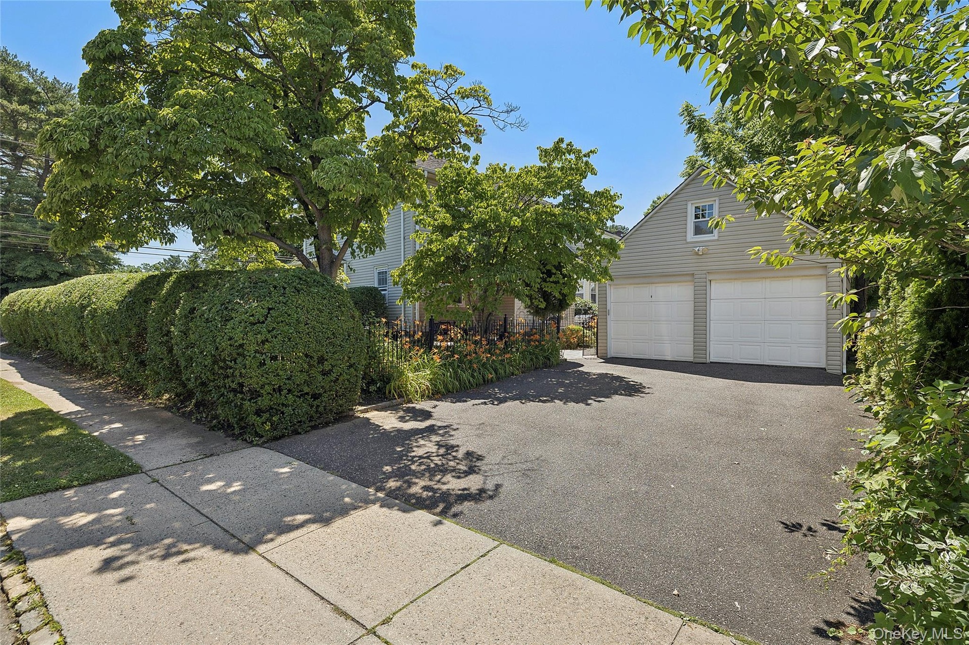 Two Car garage with large driveway