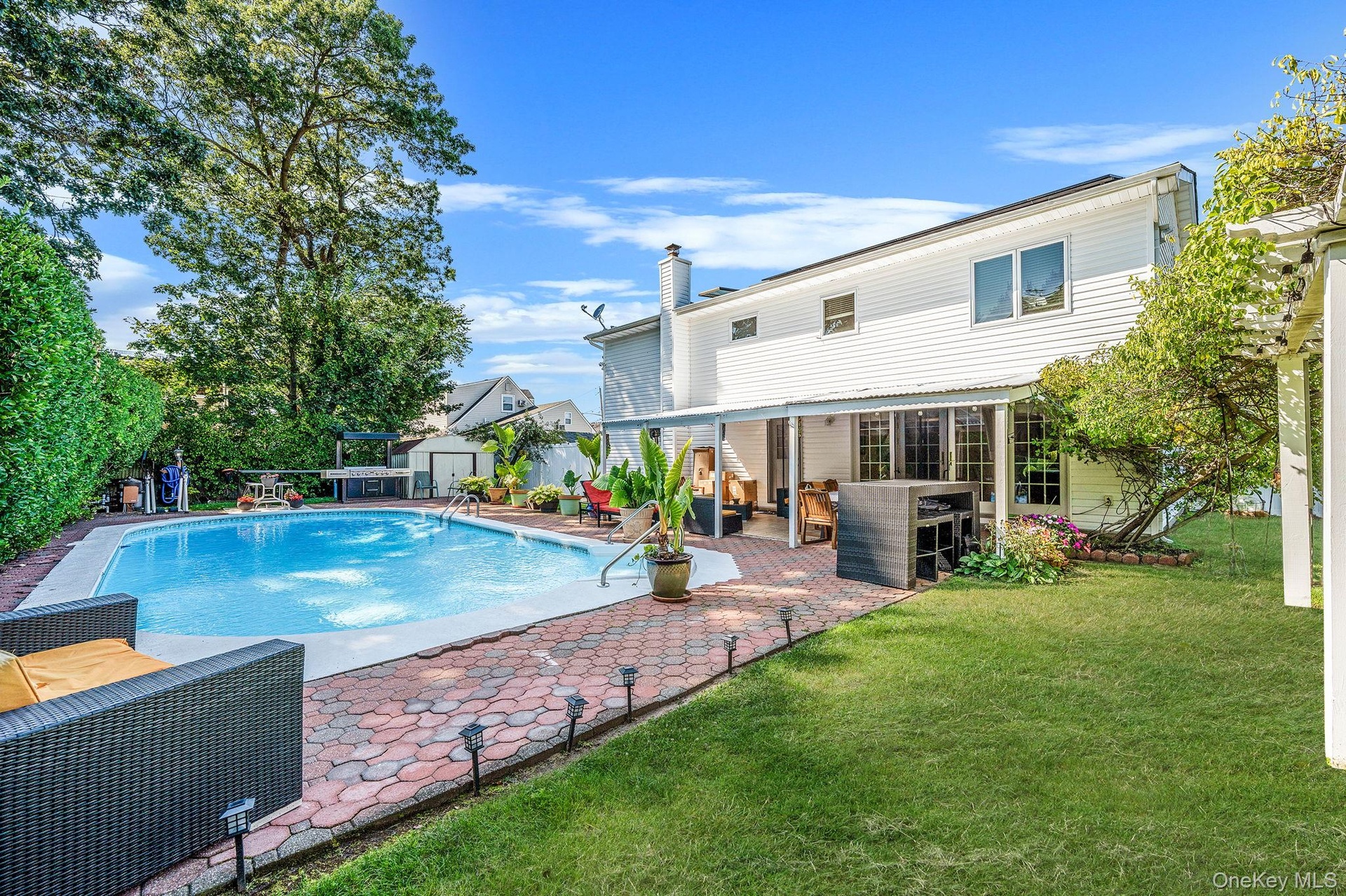 View of swimming pool featuring a patio area and outdoor lounge area