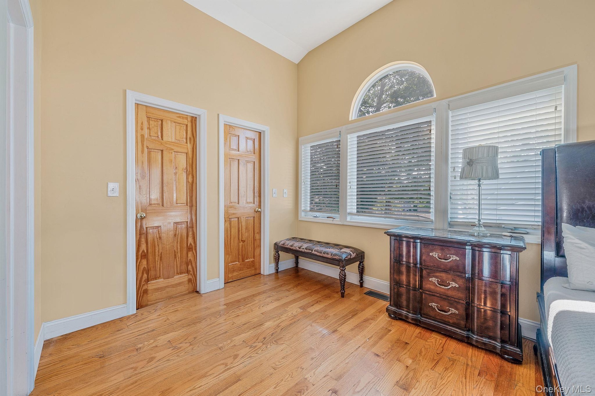 Sitting room featuring light wood finished floors and baseboards