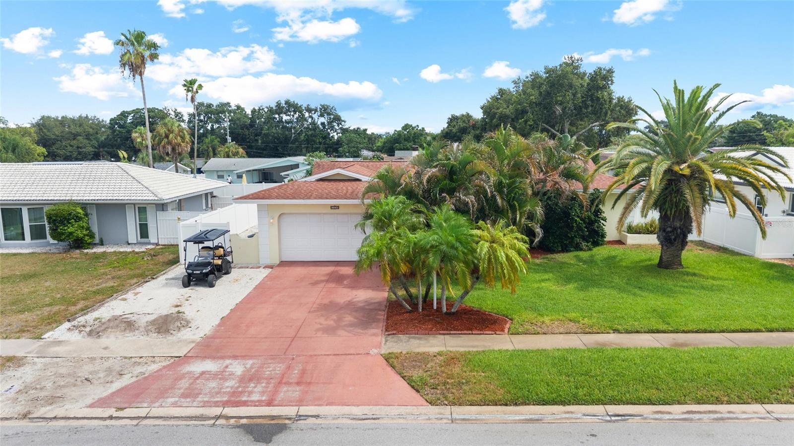 2 car Garage plus extra Shell Parking Pad for Golf Cart, Boat, 3rd vehicle, etc.