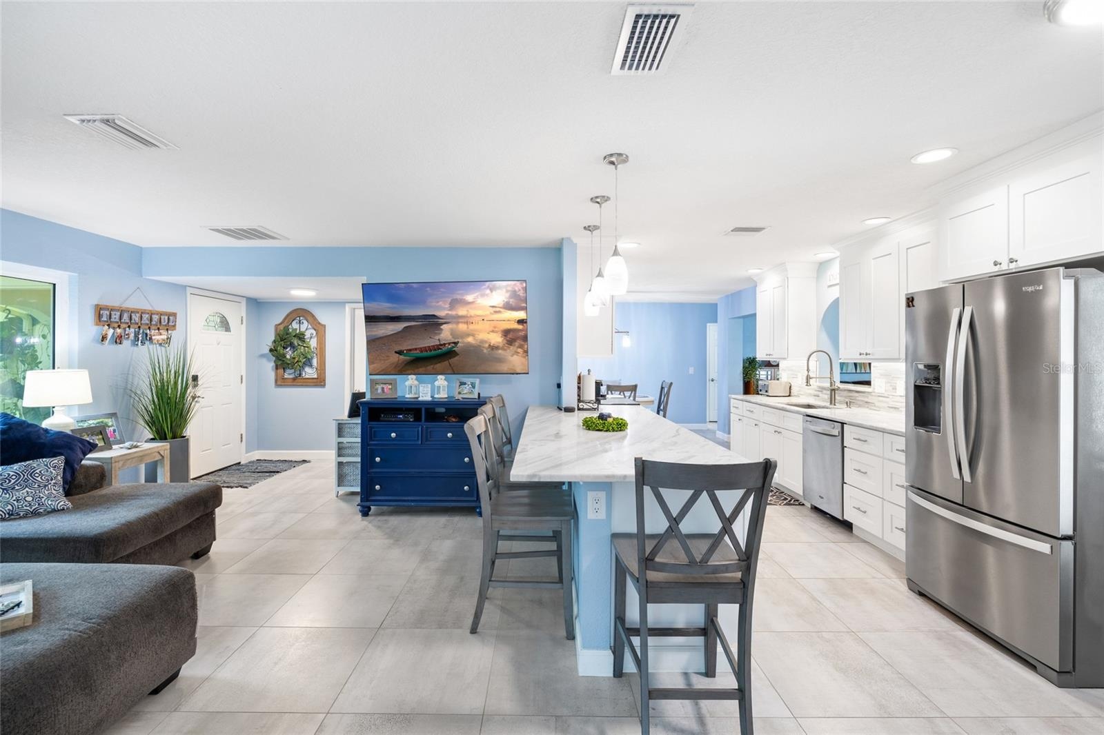 Kitchen & Living Room with SPacious Bar for entertaining