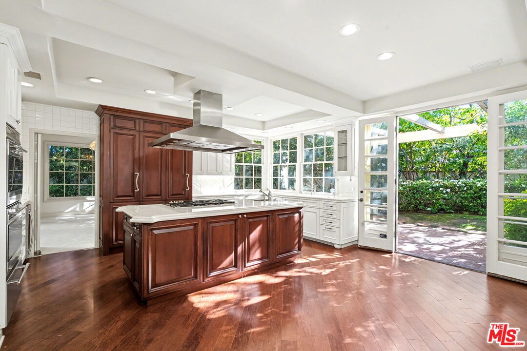 Sunny kitchen opening to a bea
