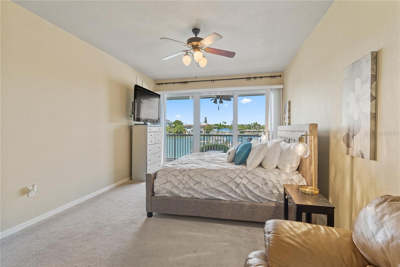 Primary Bedroom w/ stunning view of Boca Ciega Bay