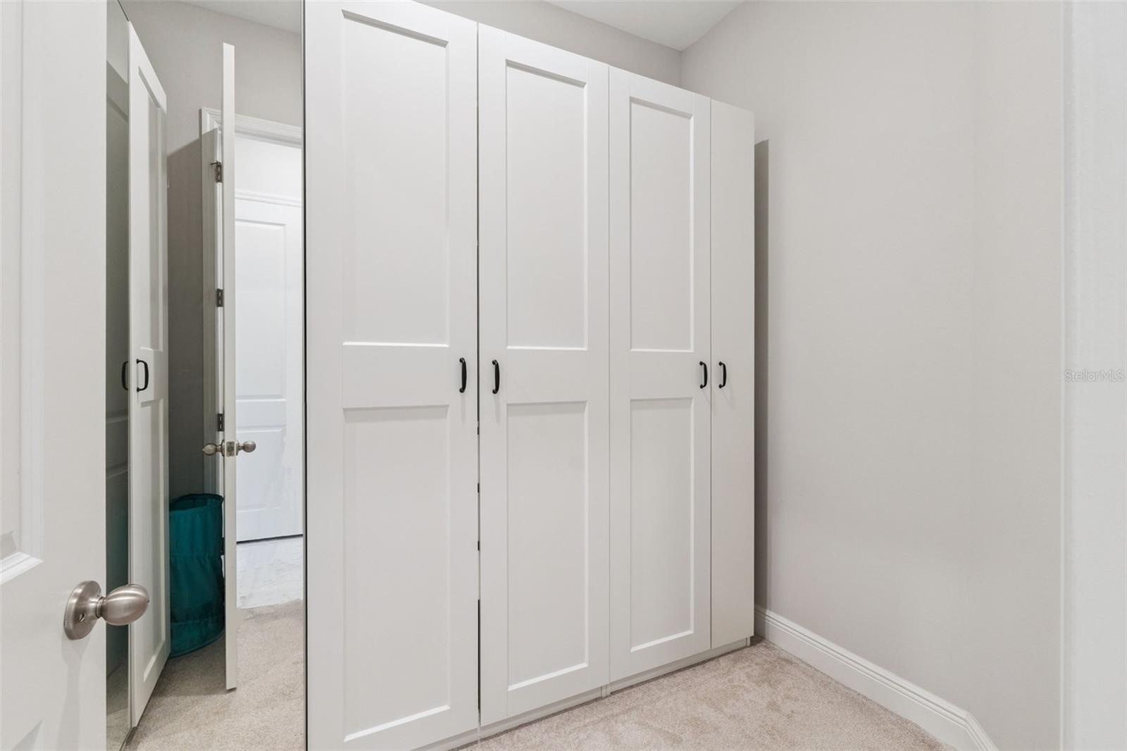 Primary Owners Suite Walk-In Closet
