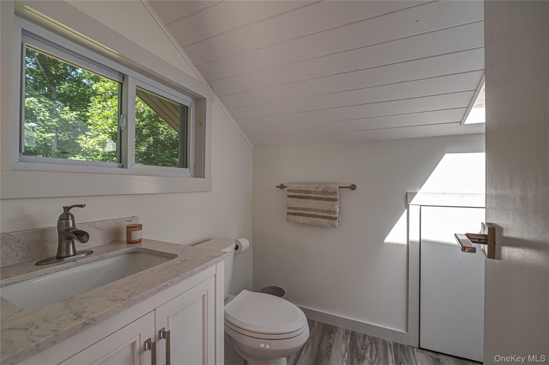 loft above detached garage full bath & seperate entrance. great as guest quarters