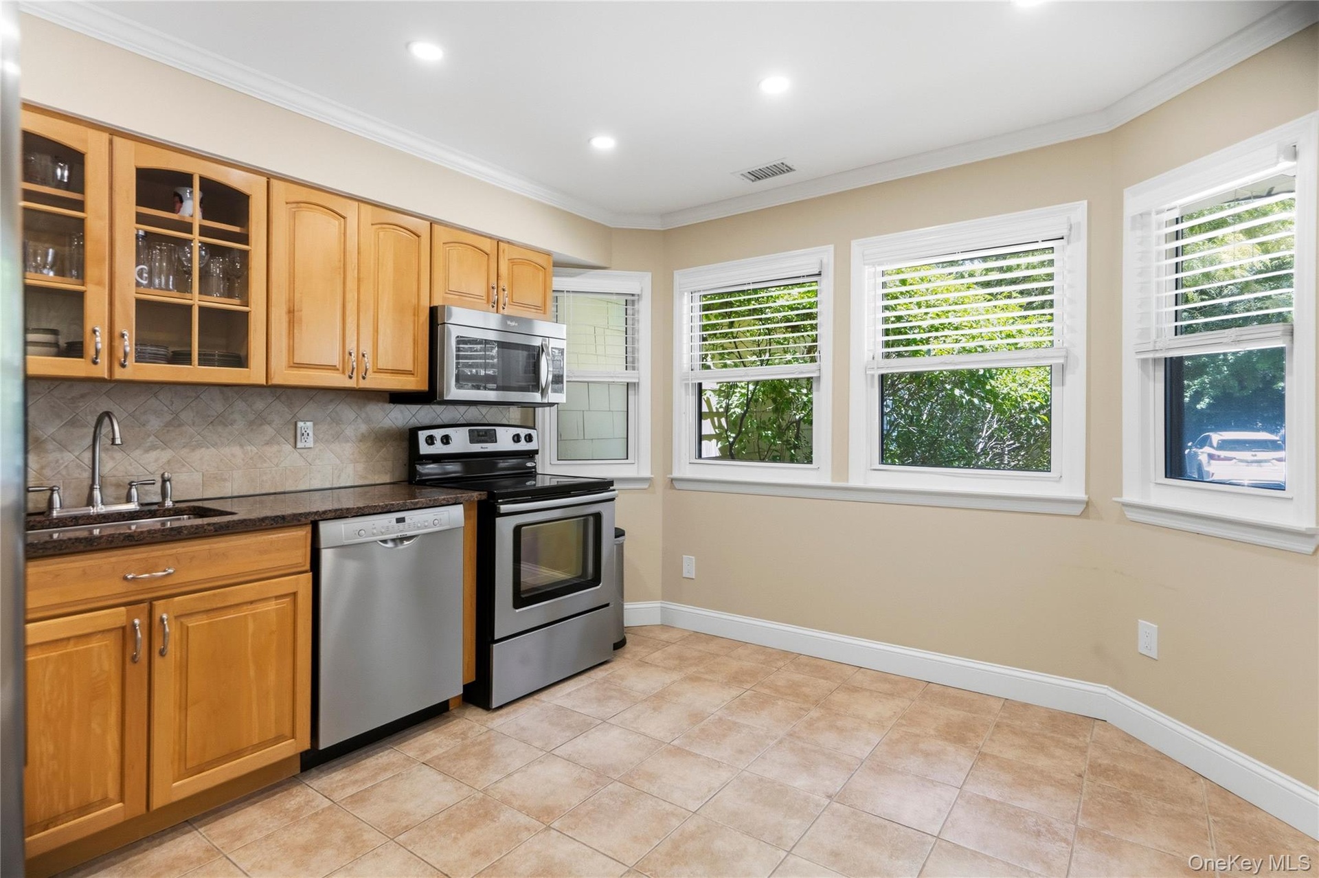 Eat-in kitchen with SS appliances and plenty of storage