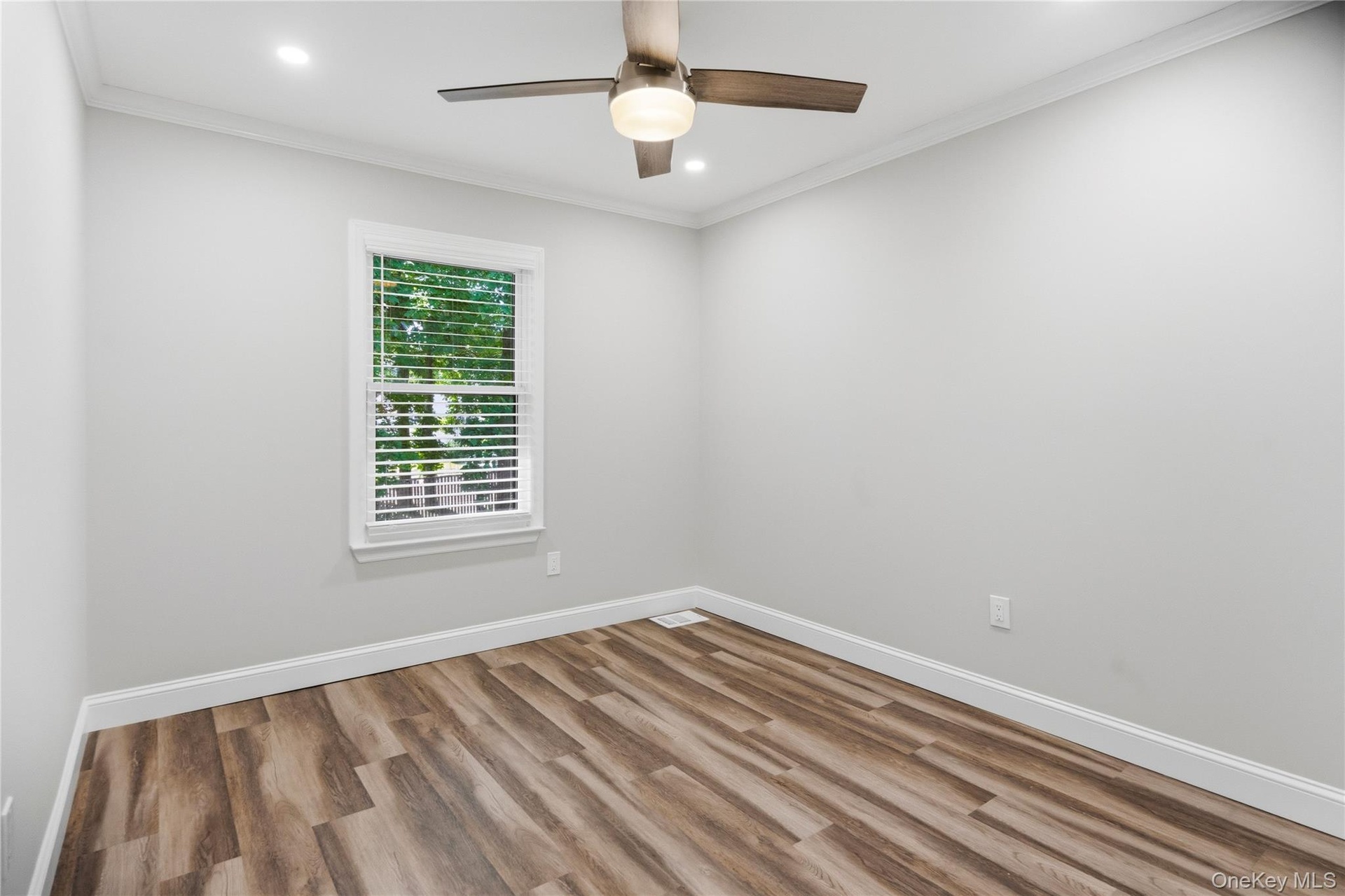 Bedroom upstairs with new flooring and double closet