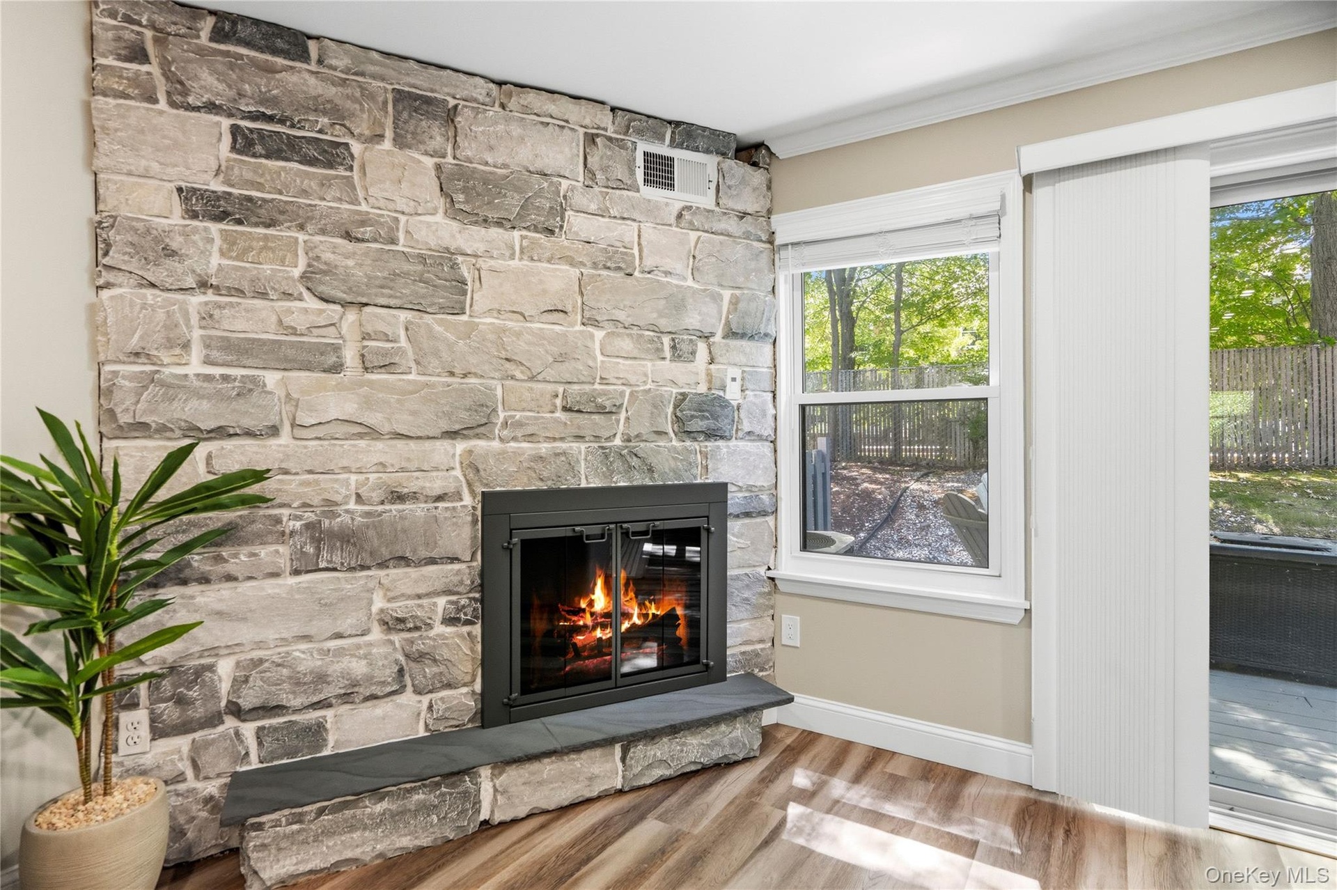 Beautiful stone wood burning fireplace