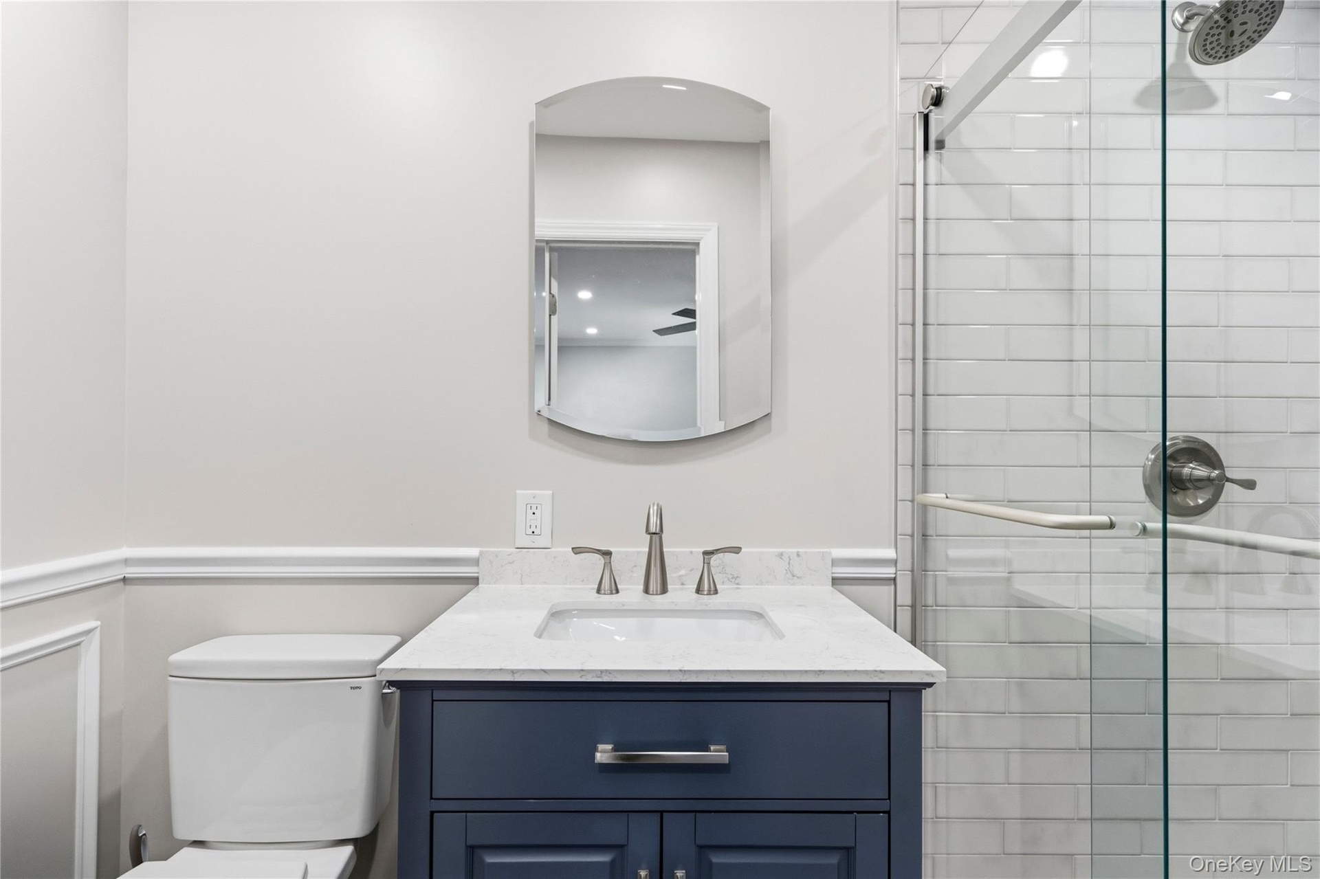 New primary bathroom with moldings