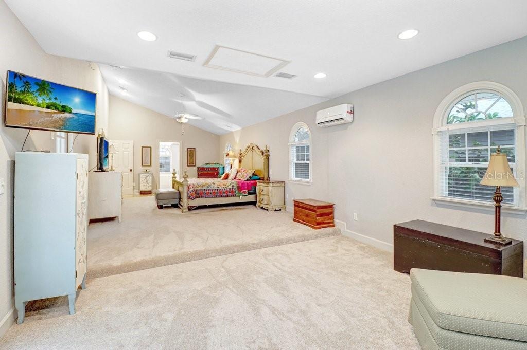 Another view of master bedroom from sitting area.