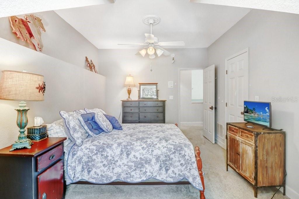 Another view of guest room with decorative ledge.