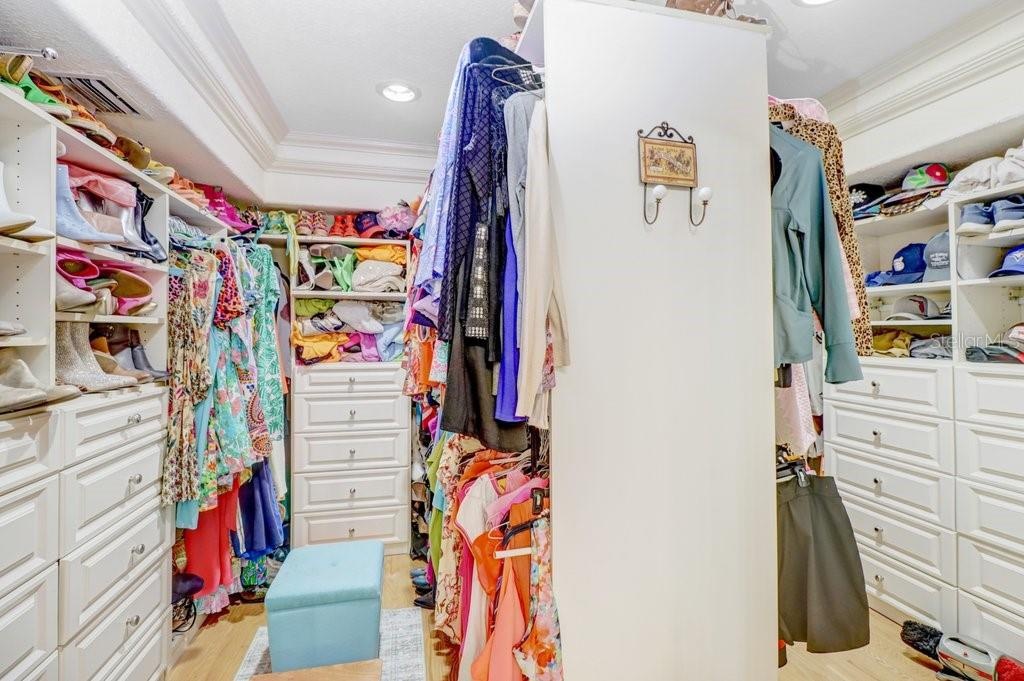 A dream closet to behold! Plenty of storage space for his and hers.
