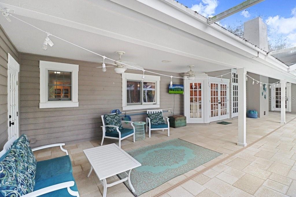 Another view highlighting the French doors around the entire back of the house.