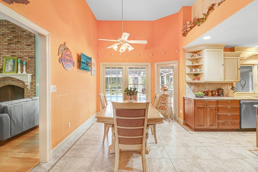 Ceramic tile throughout kitchen with pot shelves