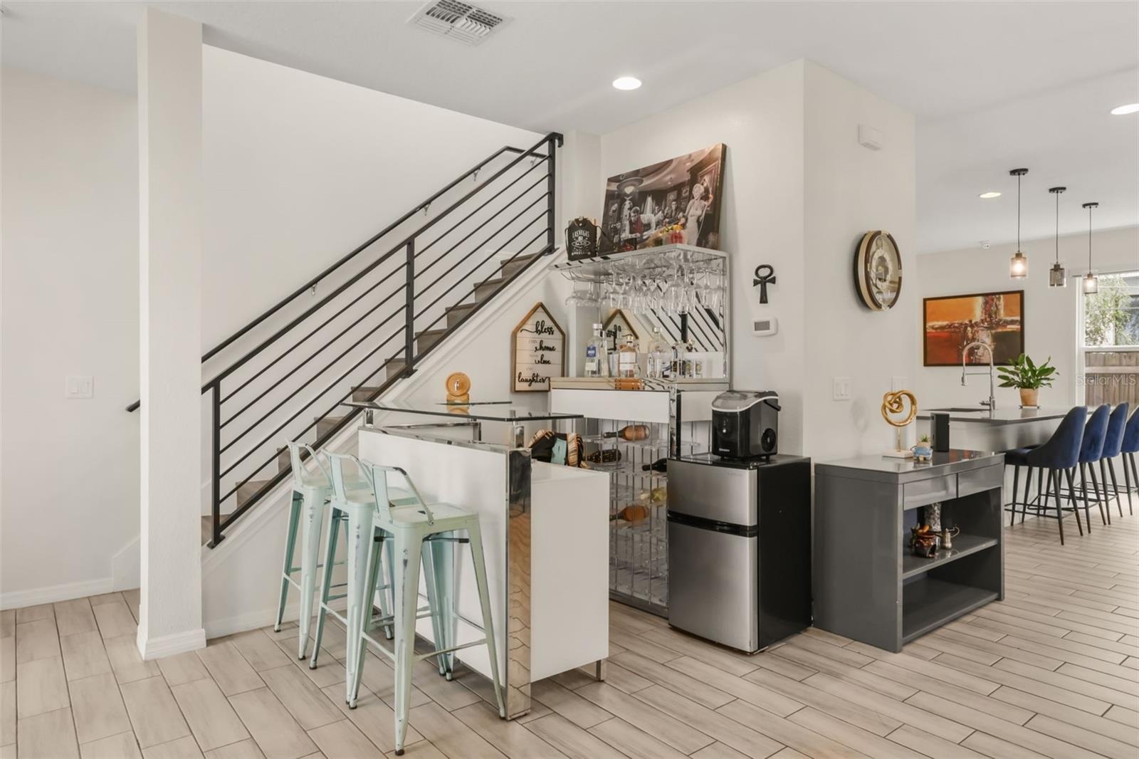Stairs leading to the second story, where all bedrooms are located