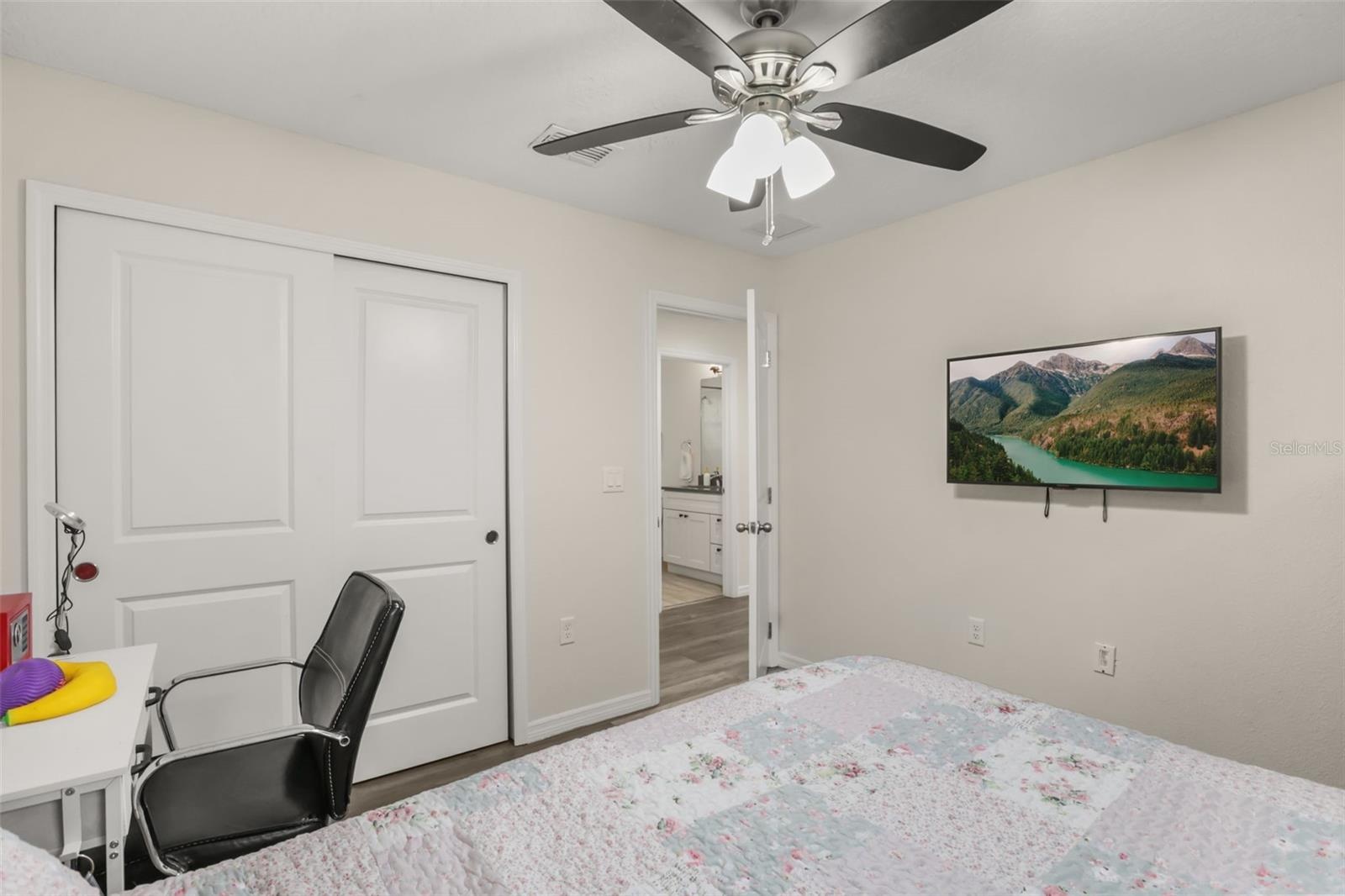 Guest room spacious closet, and a versatile layout.