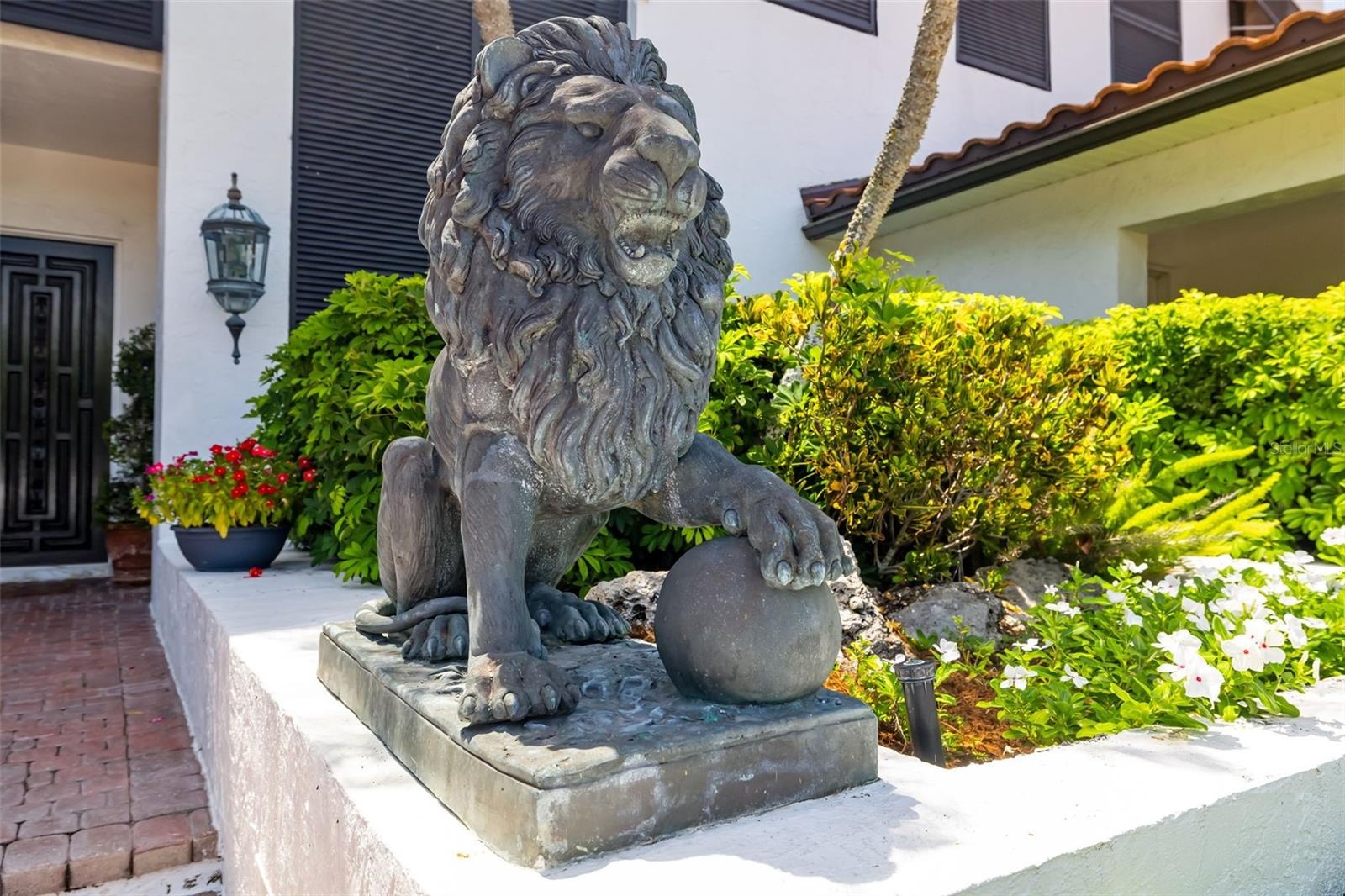 These lions have guarded over the home many years