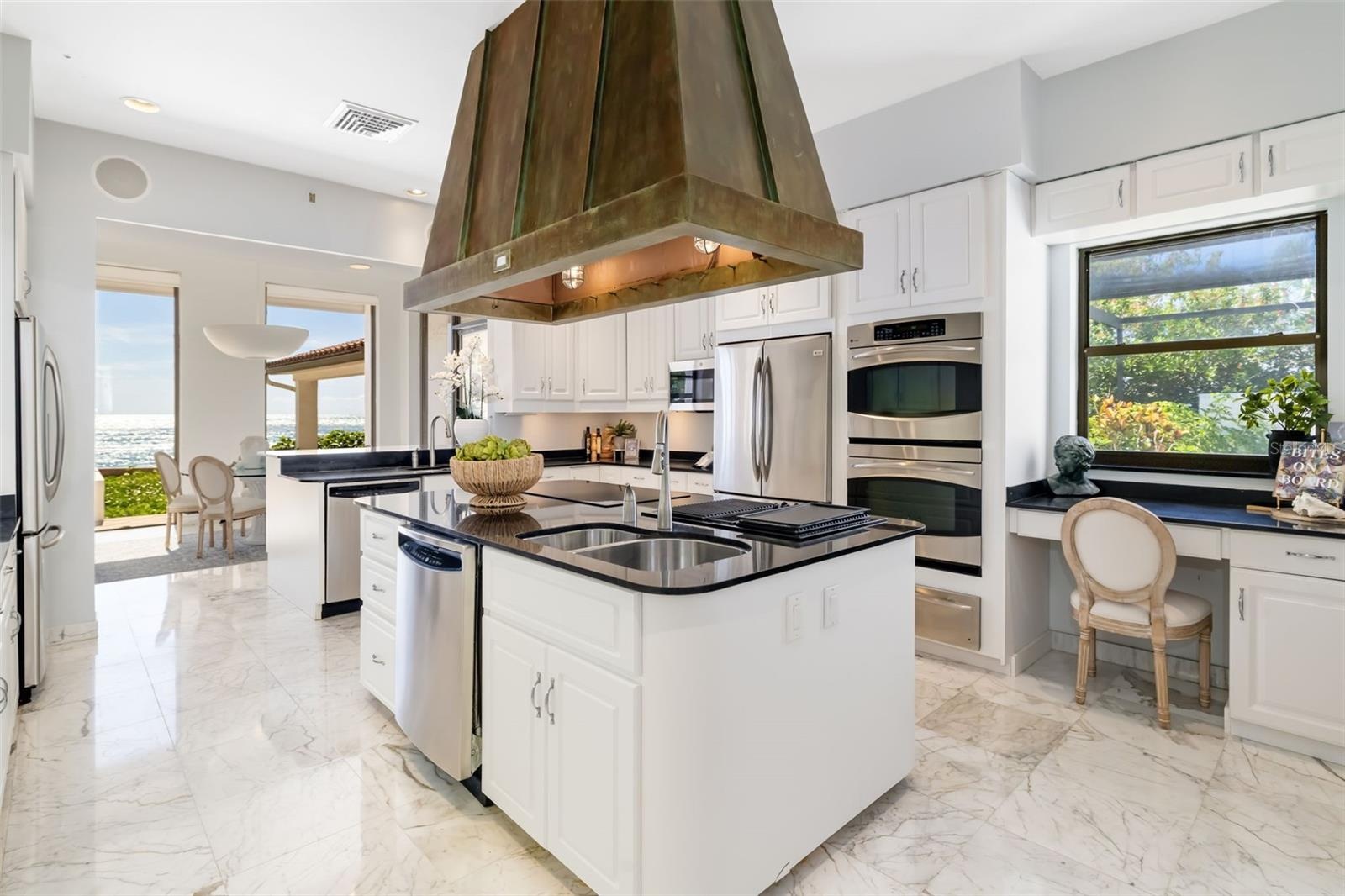 The eat-in kitchen is on the North West corner of the home and has stunning views.