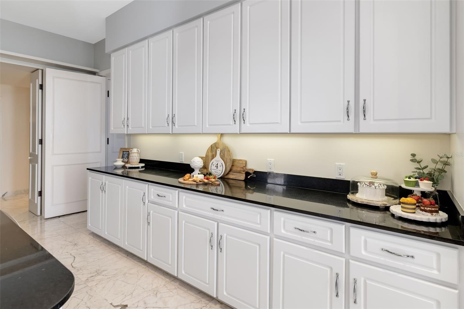 There is endless cabinet and counter space, pantry and a separate laundry room off of the kitchen