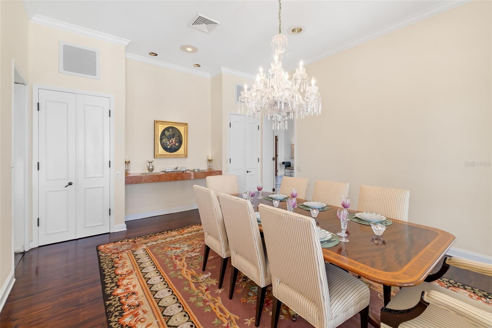 Gorgeous storage cabinets and marble built-in for entertaining family and guests....