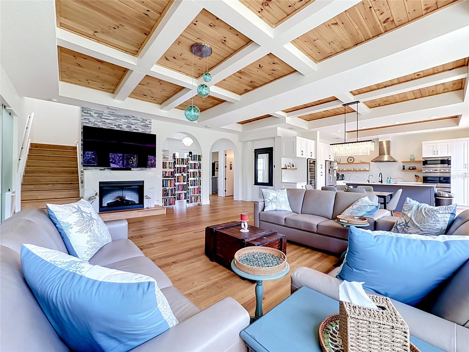 coffered ceilings enhance this family room area