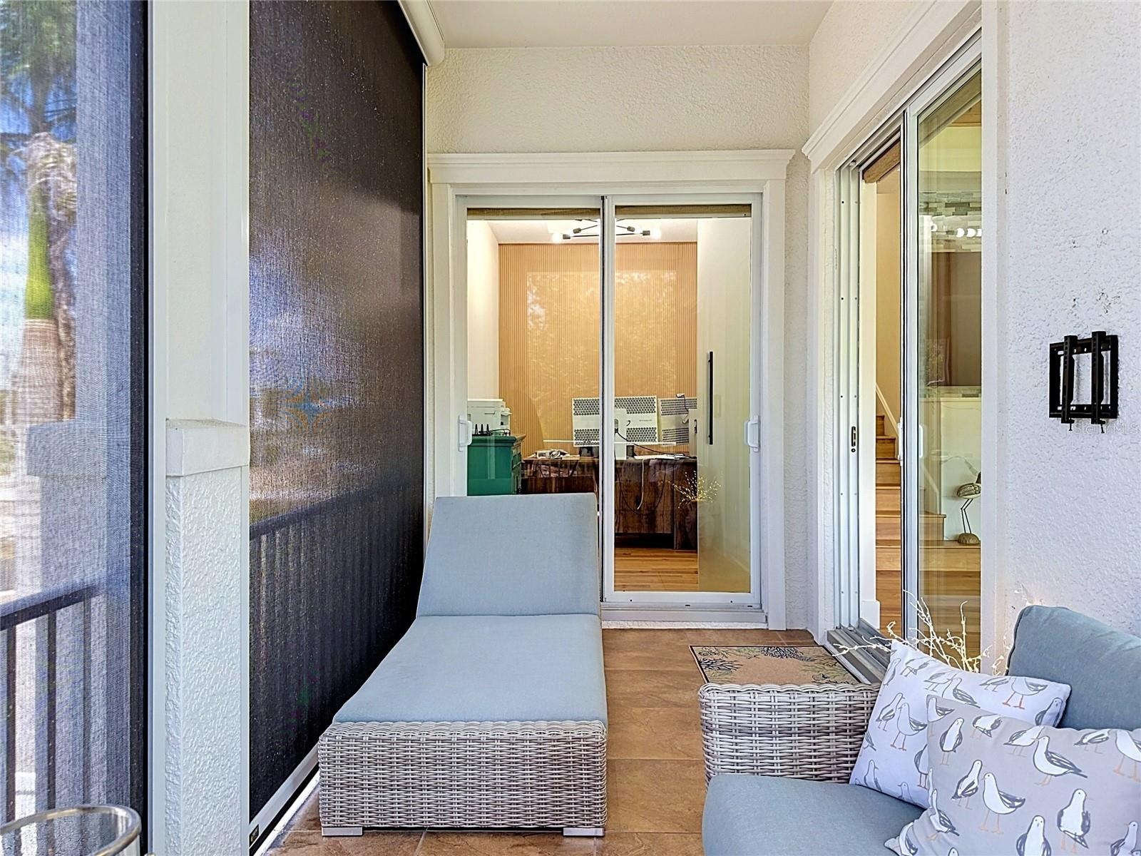Easy access from the office to the screened porch