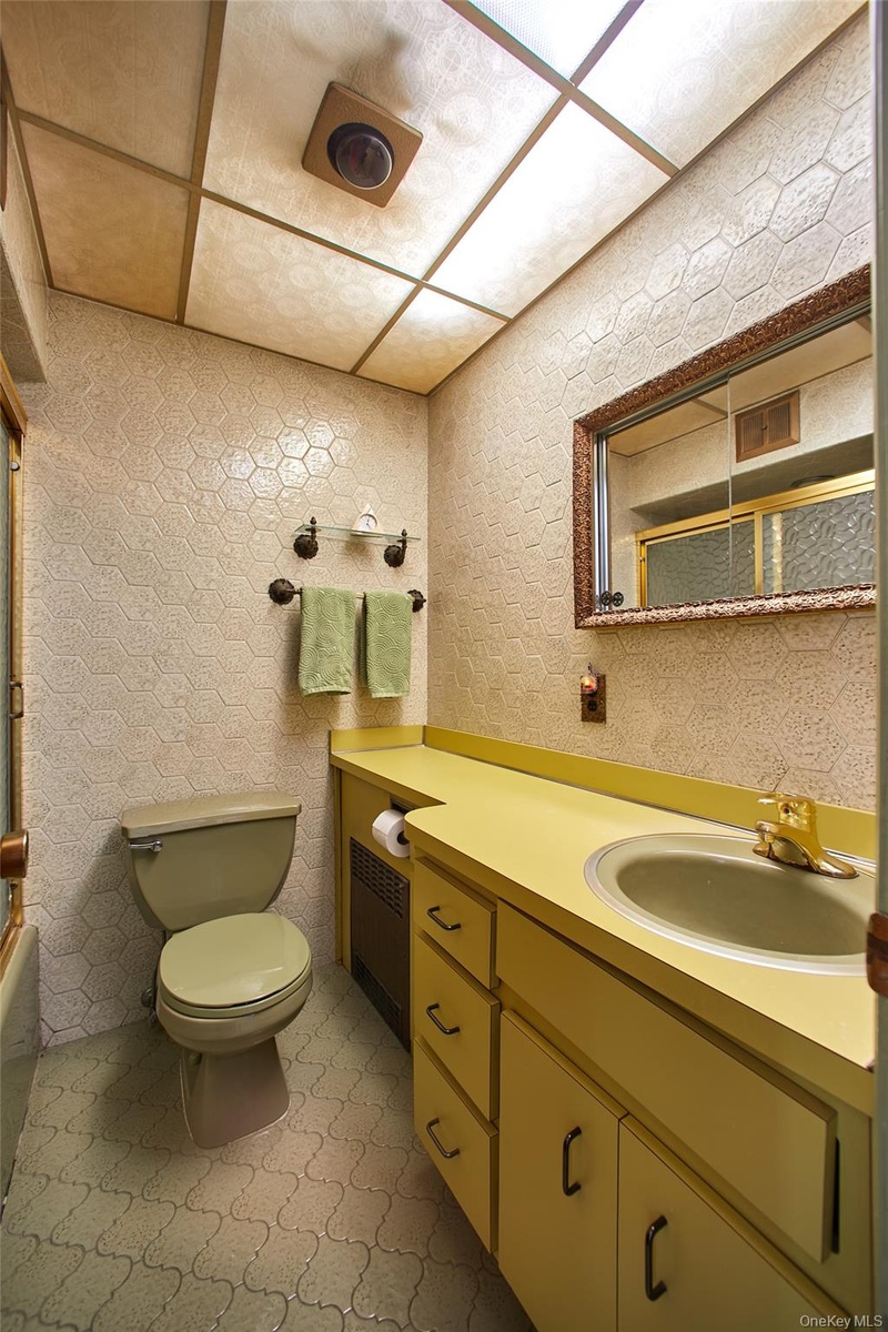 Full bathroom with bathtub- main level